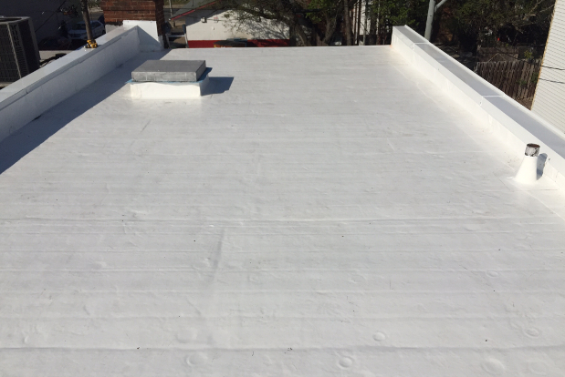 A white roof with a white coating on it commercial roofing.